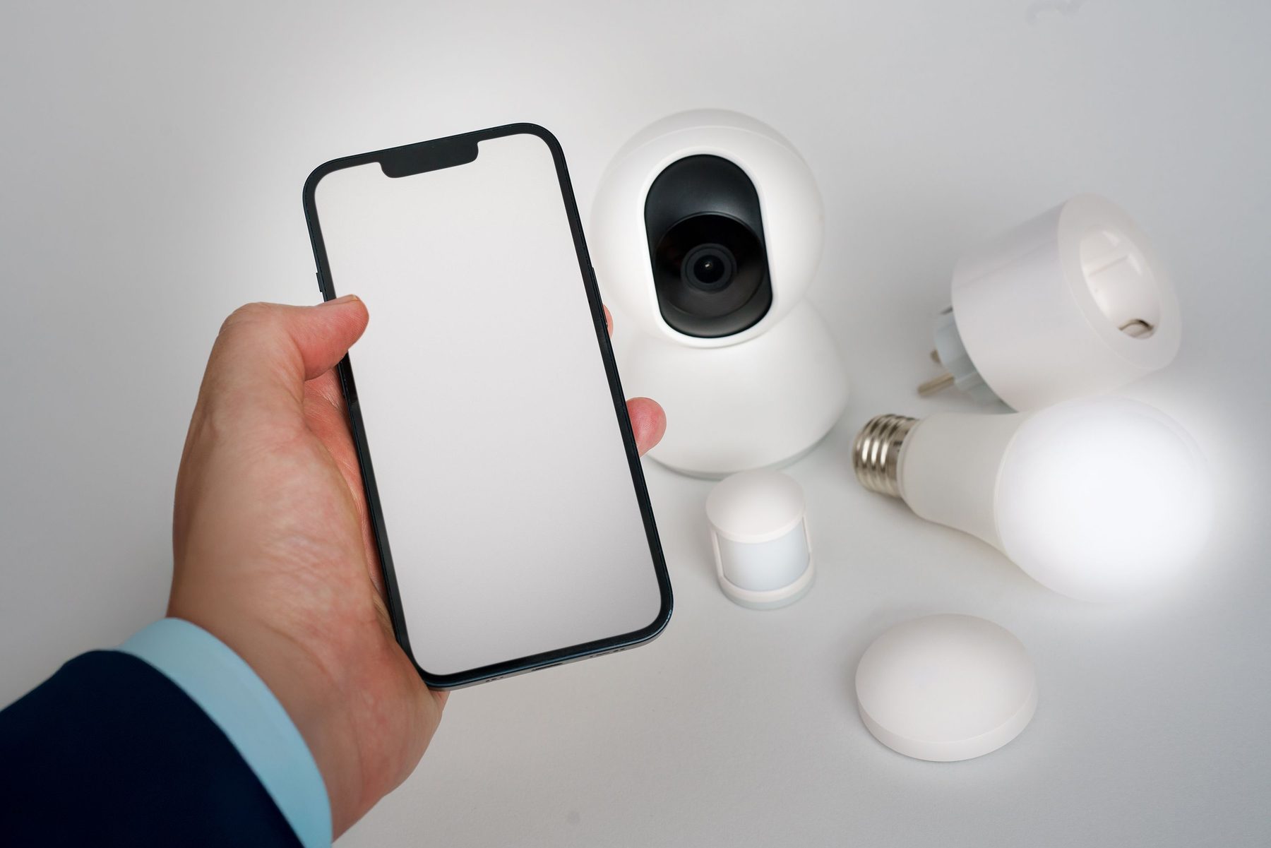 Smart home security devices and a smartphone
