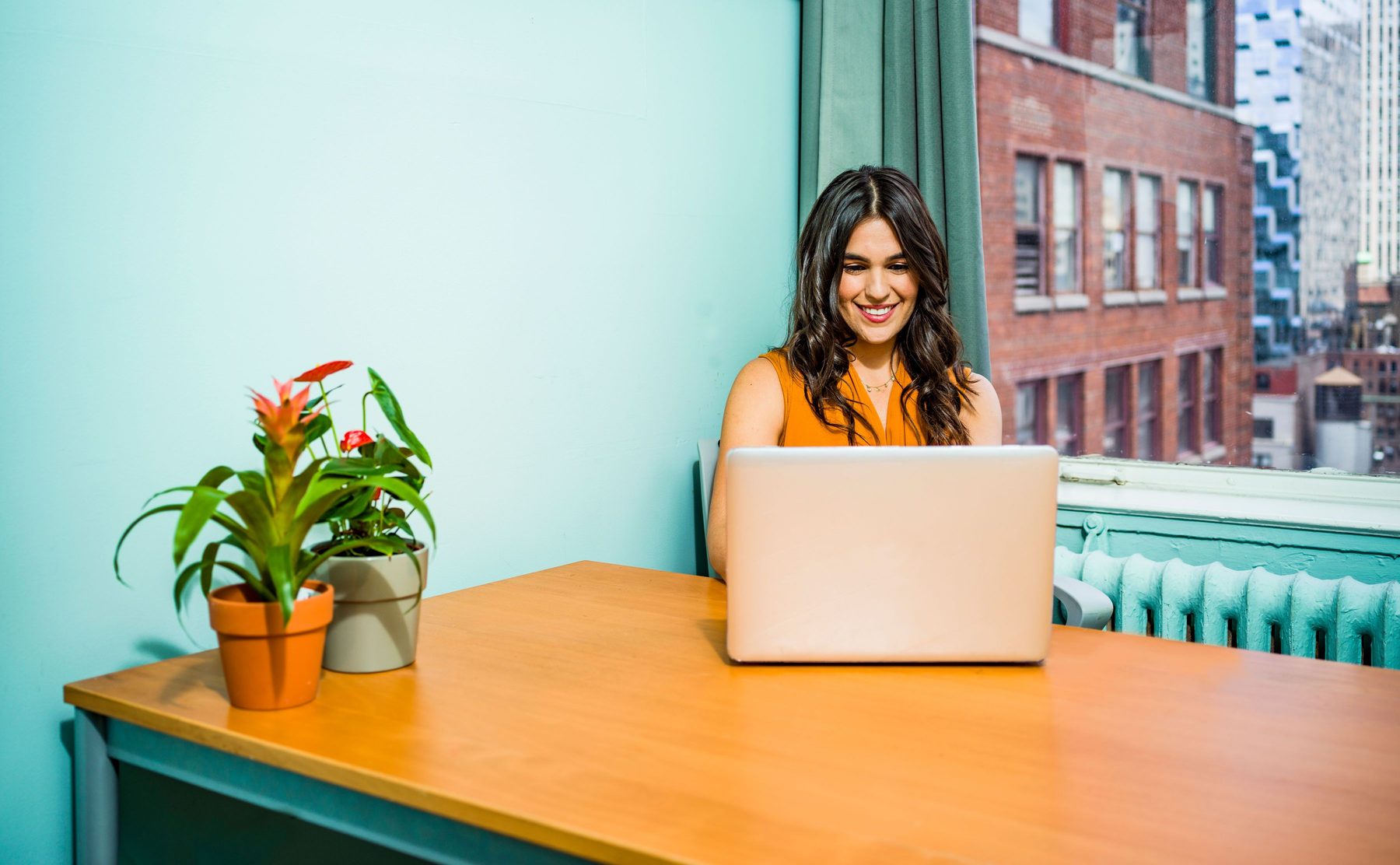 Editor working in a bright city office